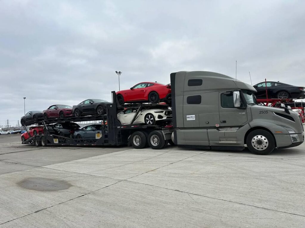 Open carrier transporting cars from San Francisco to Seattle