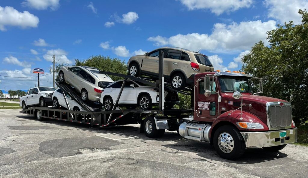 Open car trailer heading from Boston to Washington DC