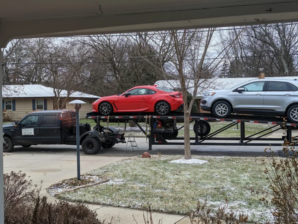 MAB Movers loading vehicle for car shipping in Vermont winter conditions