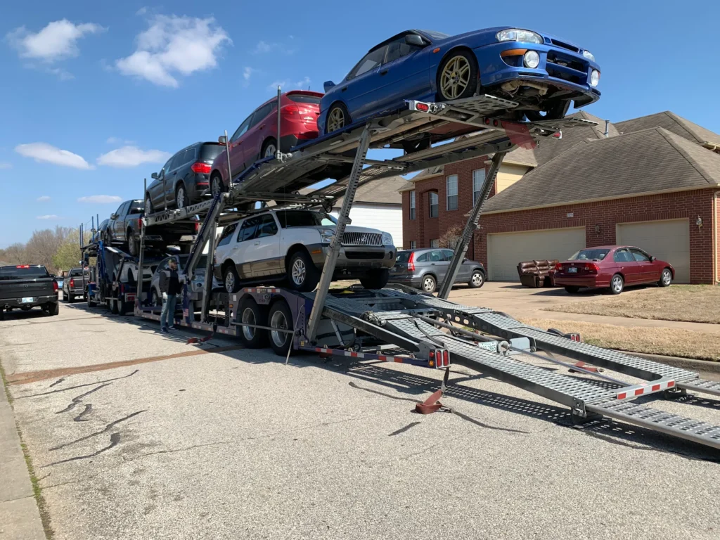 Open car carrier leaving Atlanta, GA